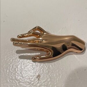 Gold Hand-Shaped Decorative brooch